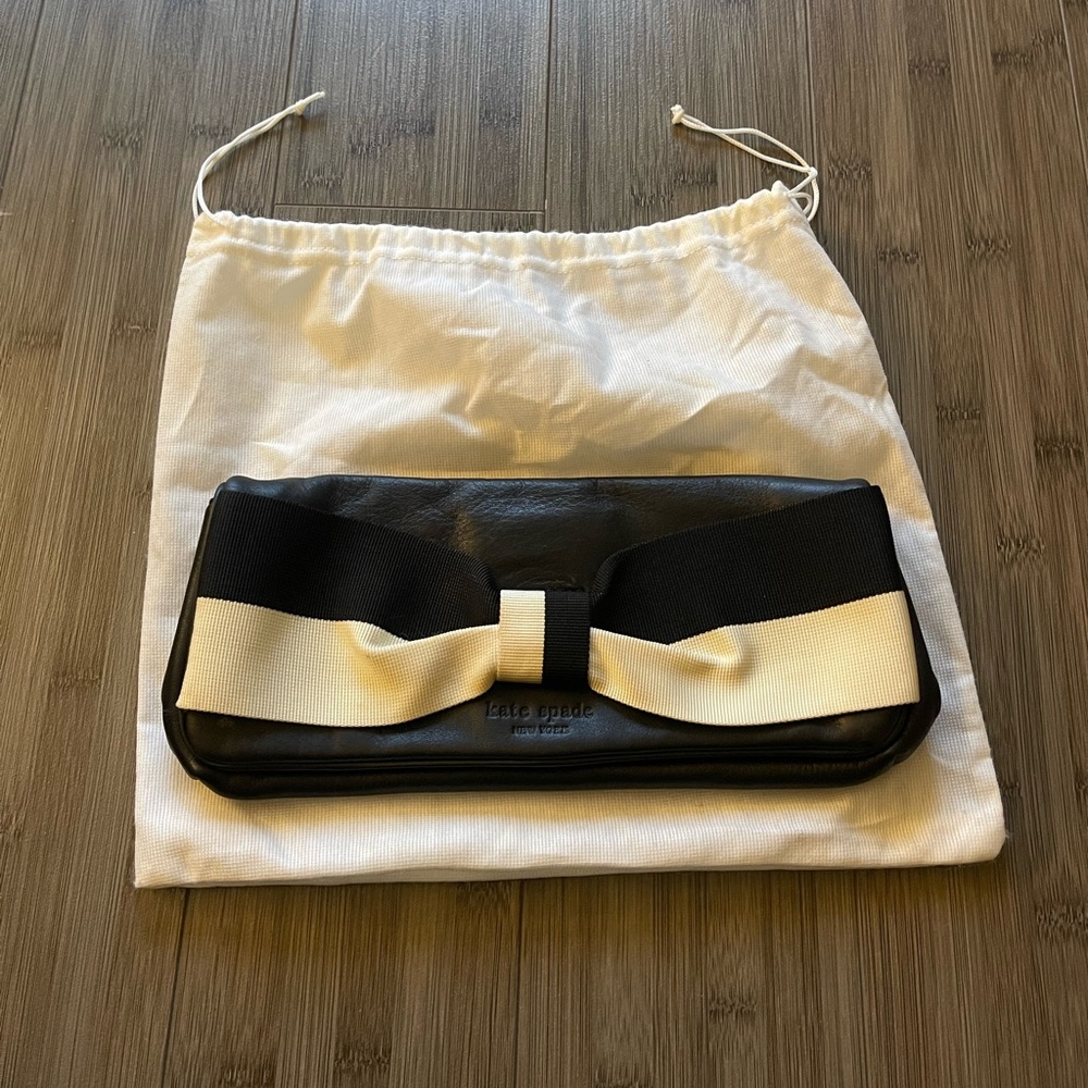 Kate spade black clutch with black and white bow